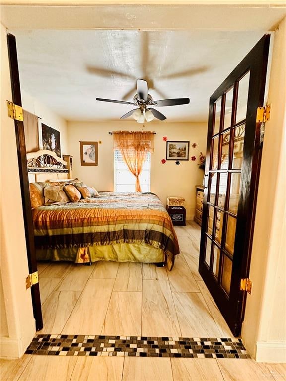 bedroom featuring ceiling fan