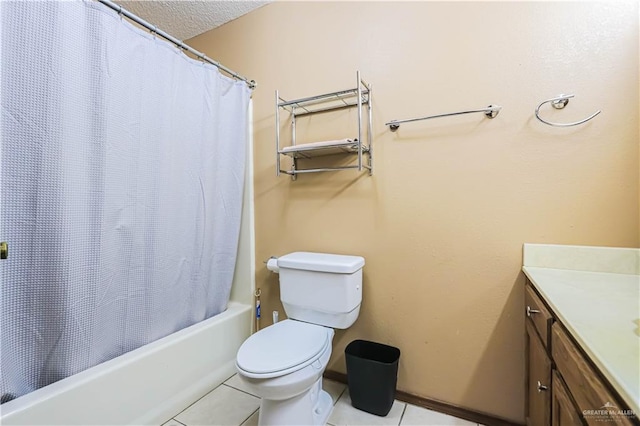 full bathroom featuring tile patterned flooring, a textured ceiling, toilet, shower / tub combo with curtain, and vanity