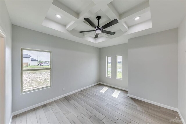 1310 S 9th St, Alamo, TX 78516 - empty room featuring coffered ceiling, recessed lighting, light wood-type flooring, baseboards, and beamed ceiling