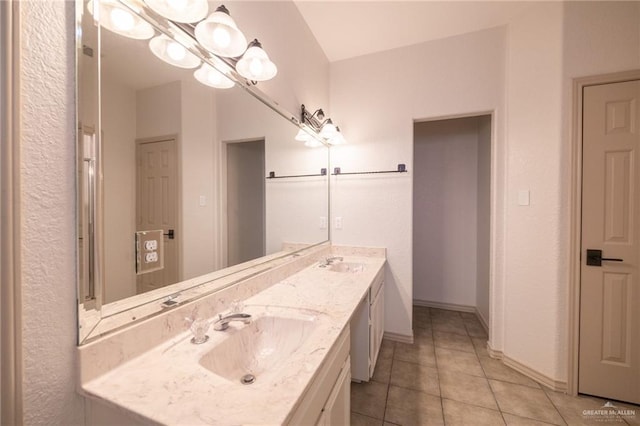 bathroom with vanity and tile patterned floors