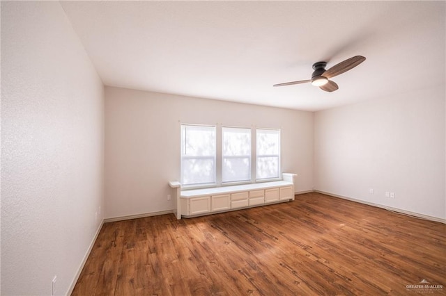 unfurnished room with ceiling fan and light hardwood / wood-style floors