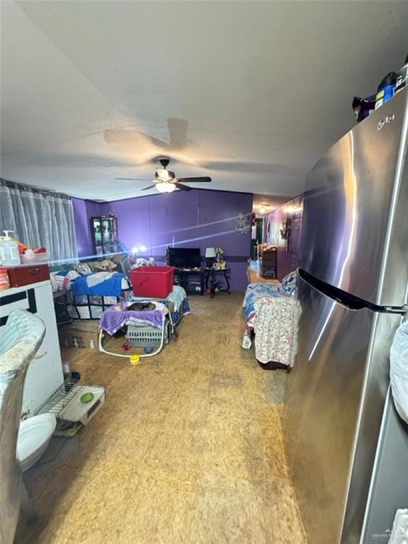38639 W Centerline Rd, Los Fresnos, TX 78566 - bedroom with freestanding refrigerator and ceiling fan