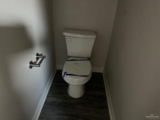 14405 Chalk Ridge Dr, Mcallen, TX 78504 - bathroom with toilet and wood finished floors