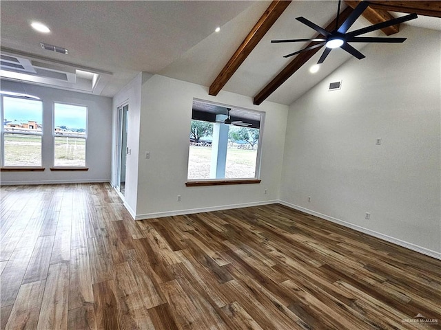 unfurnished living room with beam ceiling, plenty of natural light, high vaulted ceiling, and dark wood-type flooring