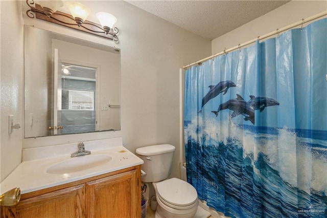 full bath featuring toilet, a shower with curtain, a textured ceiling, and vanity