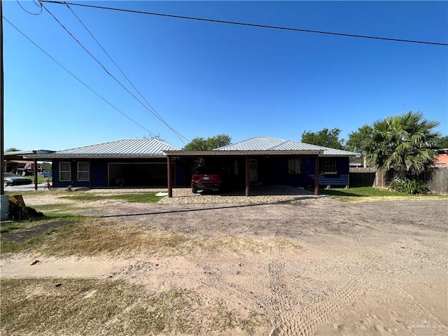 view of front of house with a carport