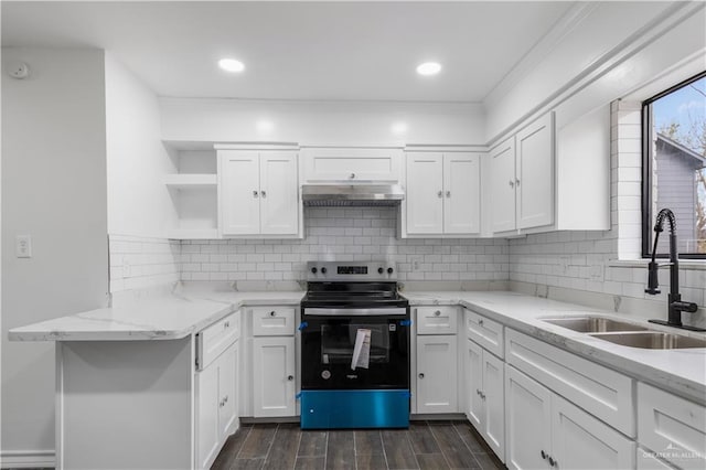 kitchen with a sink, under cabinet range hood, electric range, white cabinets, and open shelves