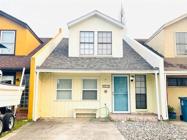 117B E Mezquite St, South Padre Island, TX 78597 - view of front of home with roof with shingles