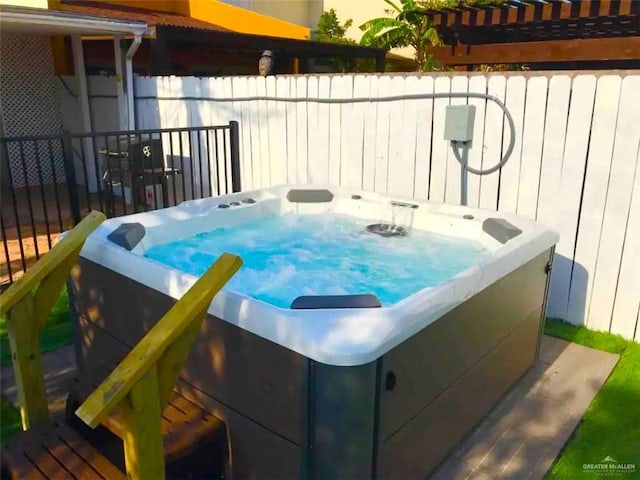 117B E Mezquite St, South Padre Island, TX 78597 - deck featuring a hot tub