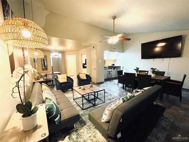 117B E Mezquite St, South Padre Island, TX 78597 - living room featuring lofted ceiling, ceiling fan, and a chandelier
