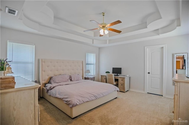 315 Oregano St, Edinburg, TX 78541 - bedroom with a tray ceiling, light carpet, and ceiling fan