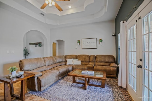 315 Oregano St, Edinburg, TX 78541 - living area with arched walkways, a ceiling fan, a raised ceiling, plenty of natural light, and recessed lighting