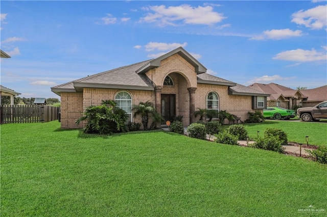 315 Oregano St, Edinburg, TX 78541 - view of front of property with brick siding and roof with shingles