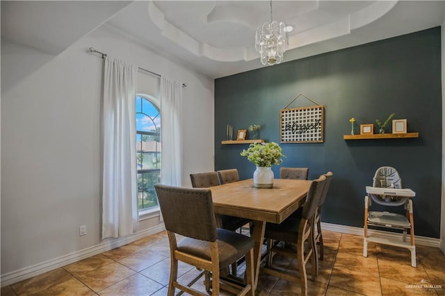 315 Oregano St, Edinburg, TX 78541 - dining space with plenty of natural light, a chandelier, a raised ceiling, and tile patterned flooring
