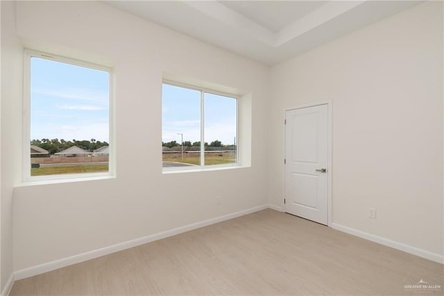 1202 N Lincoln Ave, San Juan, TX 78589 - spare room featuring light wood-style flooring and baseboards
