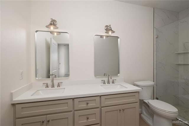 1202 N Lincoln Ave, San Juan, TX 78589 - bathroom with toilet, double vanity, and a marble finish shower
