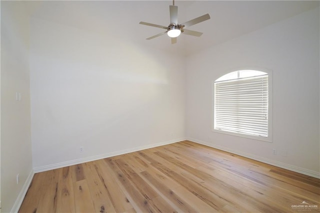 empty room featuring ceiling fan and light hardwood / wood-style flooring