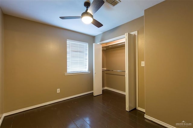 4009 Wescan Ln, Mission, TX 78572 - unfurnished bedroom with ceiling fan, dark hardwood / wood-style flooring, and a closet