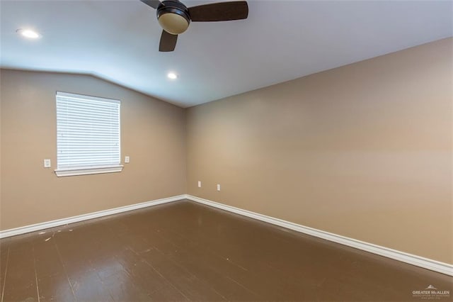 unfurnished room with wood-type flooring, vaulted ceiling, and ceiling fan