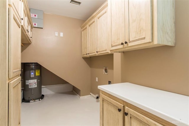 4009 Wescan Ln, Mission, TX 78572 - laundry room featuring water heater, hookup for a washing machine, and cabinets