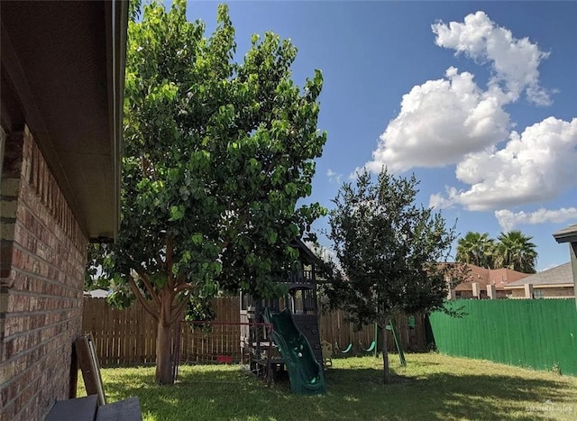 view of yard featuring a playground