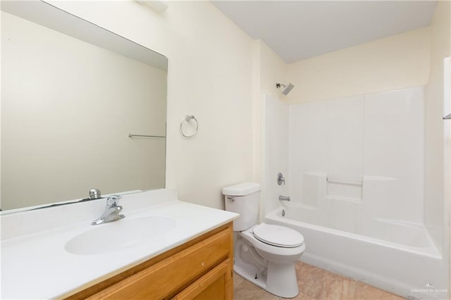 full bath featuring toilet, shower / bathing tub combination, and vanity