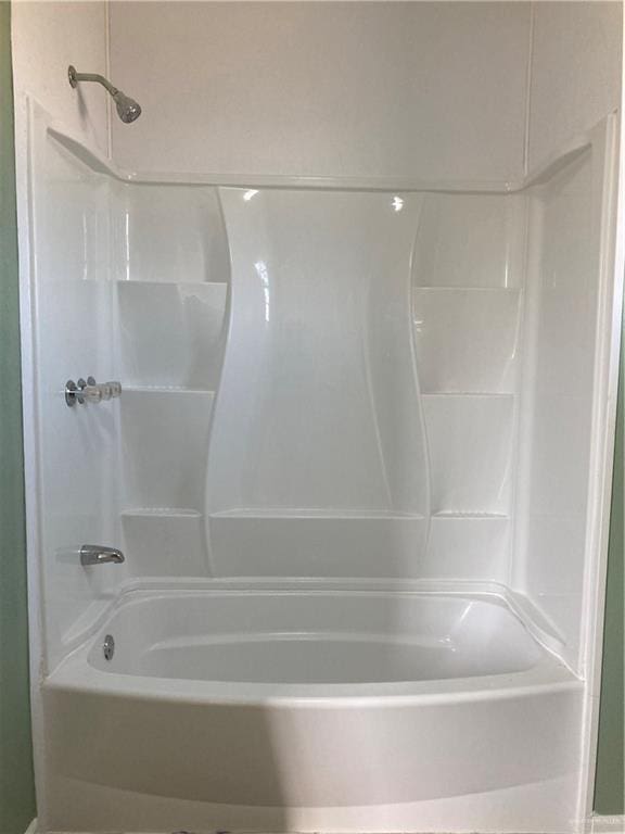 bathroom with shower / bath combination