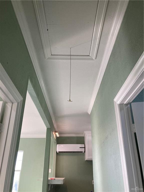 corridor with a wall mounted AC and crown molding