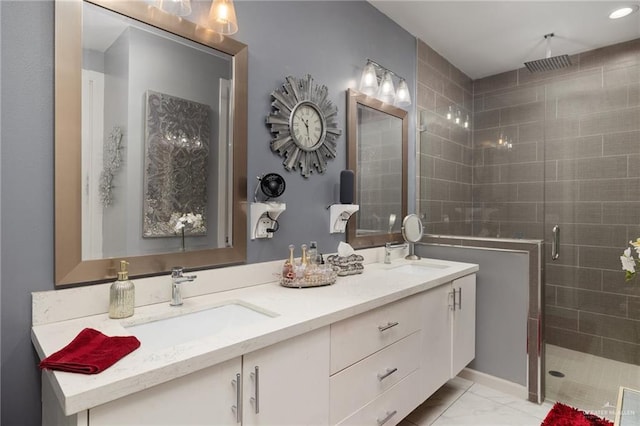 bathroom featuring vanity and walk in shower