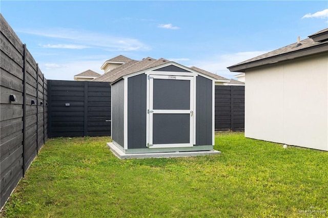 view of outbuilding featuring a yard