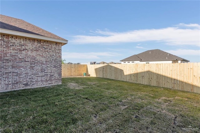 view of yard featuring a fenced backyard