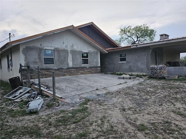 rear view of property with a patio