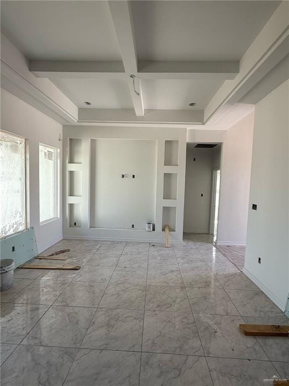 unfurnished living room featuring built in features, beamed ceiling, coffered ceiling, and marble finish floor