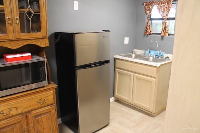 kitchen featuring appliances with stainless steel finishes and sink