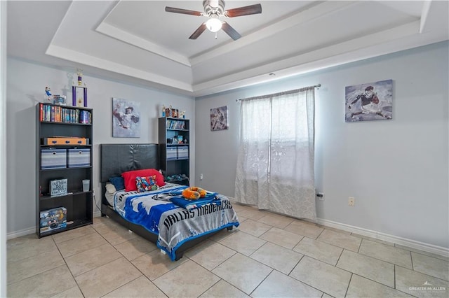 612 Persimmon Ave, Edinburg, TX 78539 - bedroom featuring a raised ceiling, tile patterned flooring, and ceiling fan