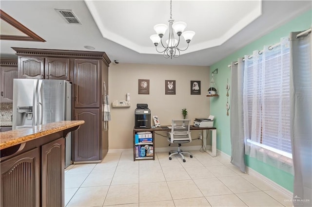 612 Persimmon Ave, Edinburg, TX 78539 - home office featuring a tray ceiling, a chandelier, and light tile patterned floors