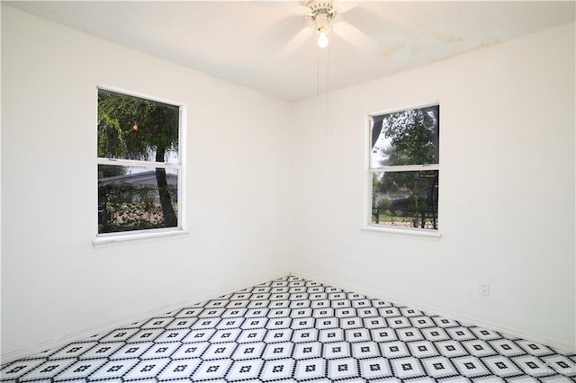 empty room featuring ceiling fan