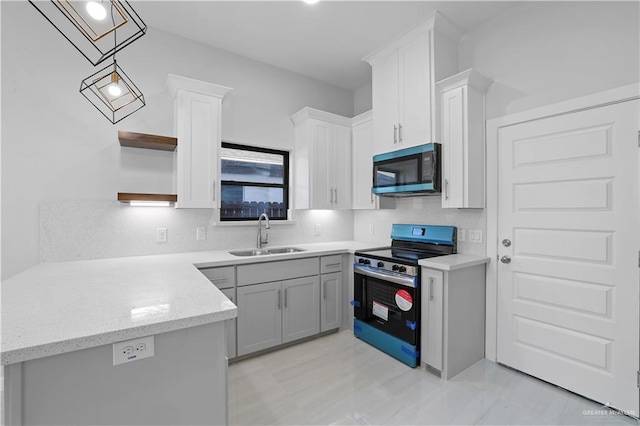 3700 E Diamond Head Ave Lot 19, Alton, TX 78573 - kitchen with stainless steel appliances, a sink, open shelves, white cabinetry, and decorative backsplash