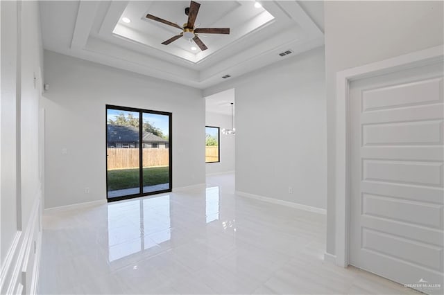 3700 E Diamond Head Ave Lot 19, Alton, TX 78573 - unfurnished room with a ceiling fan, a tray ceiling, baseboards, recessed lighting, and light tile patterned floors
