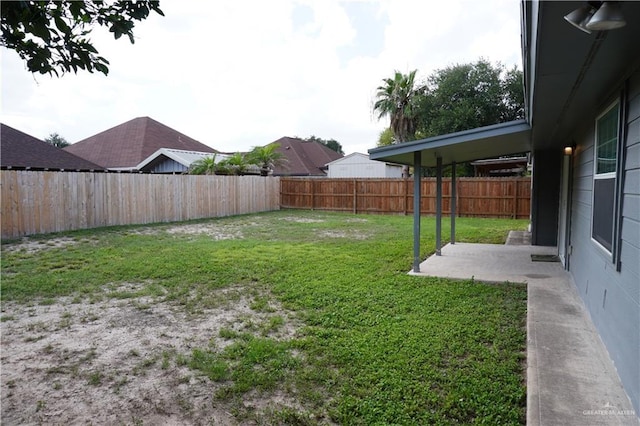 2405 Sundrop Ave, Mission, TX 78574 - fenced backyard with a patio