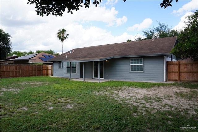 2405 Sundrop Ave, Mission, TX 78574 - back of house with a patio area and a fenced backyard