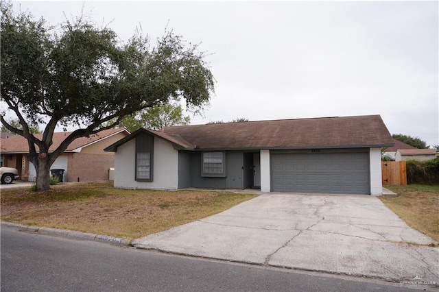 2405 Sundrop Ave, Mission, TX 78574 - ranch-style house with a garage, concrete driveway, and brick siding