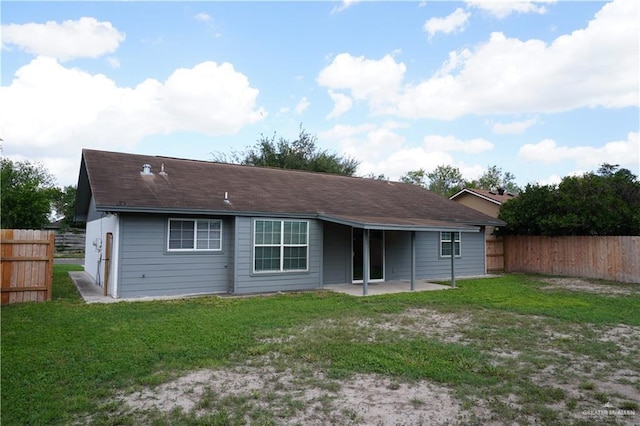 2405 Sundrop Ave, Mission, TX 78574 - rear view of house featuring a patio and a fenced backyard