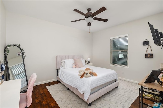 2803 Thompson St, Mission, TX 78573 - bedroom featuring baseboards, wood finished floors, and ceiling fan
