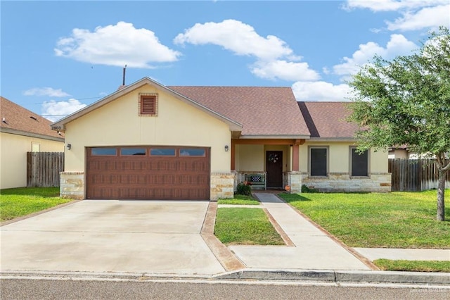 2803 Thompson St, Mission, TX 78573 - view of front facade with stone siding, an attached garage, and stucco siding