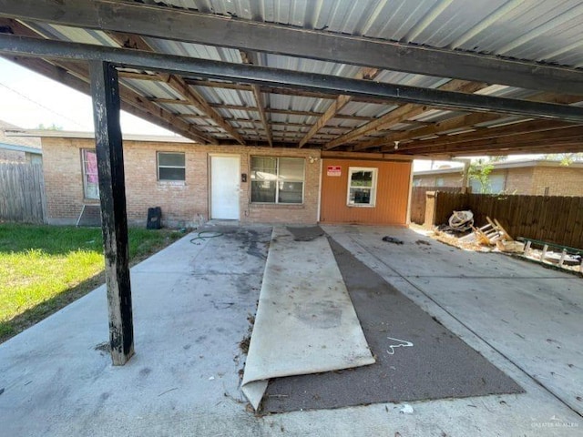 exterior space featuring a carport