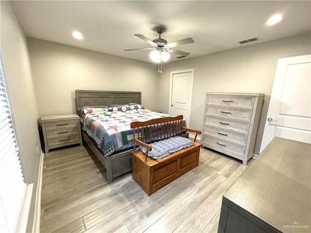 bedroom featuring ceiling fan and light wood-type flooring