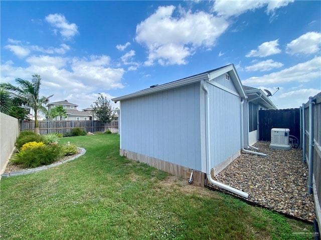 view of property exterior with a lawn