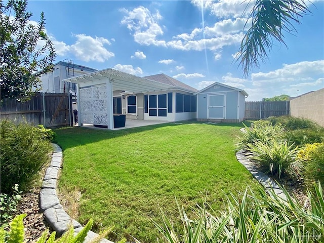 back of property featuring a pergola, a yard, and a storage unit