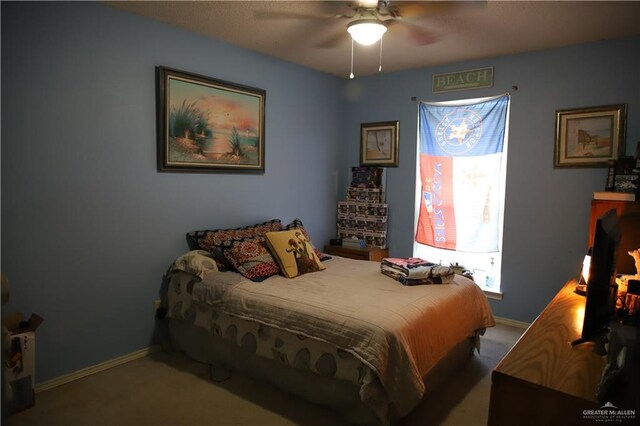 1811 Crown Pointe Blvd, Mission, TX 78572 - carpeted bedroom featuring a ceiling fan and baseboards